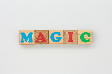 Wooden Cubes Display the Word Magic