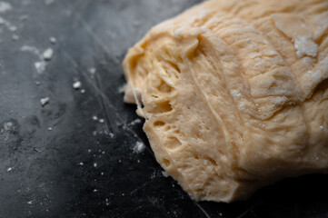 Homemade baking idea with raw dough on kitchen table