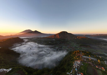 Sunrise over Mt Batur view from Pinggan village in Kintamani Bali Indonesia