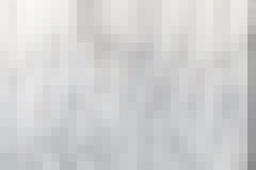 Pixelated gray and white background with a subtle gradient and a modern, abstract aesthetic