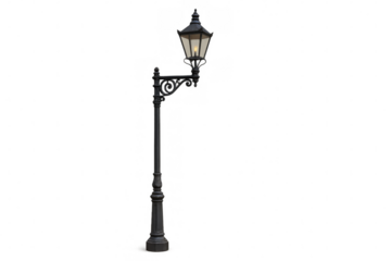 Vintage style cast iron lamppost illuminating at night, classic street lighting design providing old world charm, transparent background