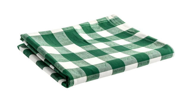 Folded square cloth with green and white checkered pattern against a black background