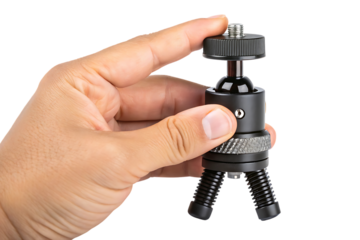 hand holding small black metal tripod, with textured grip and screw mount, cutout, PNG isolated on a white or transparent background, AI