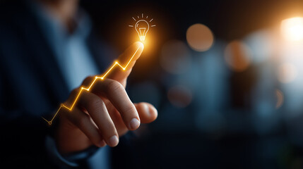 Faceless businessperson hand touching transparent screen with lightbulb icon and ascending graph digital analytics overlay business growth strategy data visualization creative
