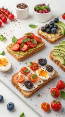 Variety of toast with avocado, tomato, egg, and berries on table