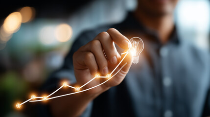 Hand drawing exponential growth curve with lightbulb viral strategy concept creative growth hacking digital scaling tactics whiteboard visible face not shown defocused