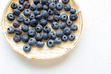 Close-Up of Wild Blueberries in a Wooden Bowl
