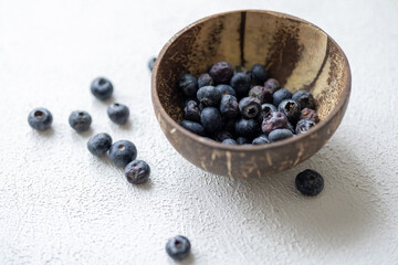 Close-Up of Wild Blueberries in a coconut Bowl
