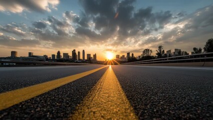 Empty city road with yellow line leading to sunrise over modern skyline concept of journey new beginning urban morning and motivation