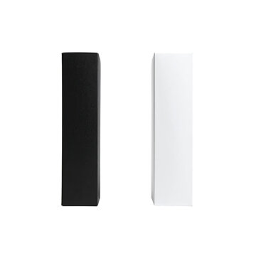 Two rectangular boxes, one black, one white, stand side-by-side against a black background