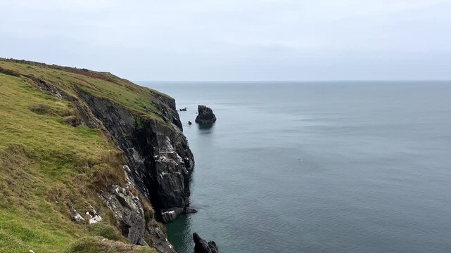 Small Sea Stack Ynys Bach in Trefor on the Coast of Llyn Peninsula, Gwynedd, North Wales, United Kingdom