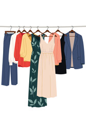 An assortment of fashionable clothing items hangs on a rack.