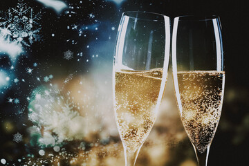 toasting with champagne glasses against holiday lights