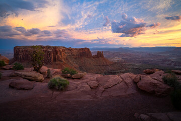 sunset at grand view point overlook near moab in canyonlands island in the sky in utah, usa
