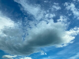 Vivid Blue Sky with Bright White Cumulus Cloud