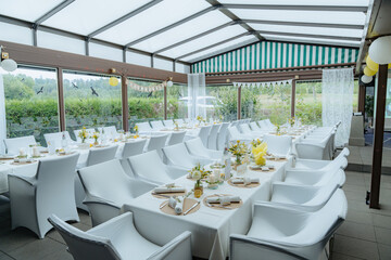 Elegant Wedding Reception Setup in Glass Venue