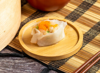 delectable steamed shrimp dumpling, Phoenix Eyes a taste of authentic Asian tradition. Perfect for restaurant marketing or food blog content.