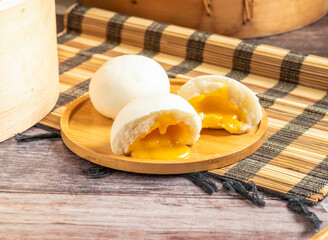 Sweet aroma of custard buns or Quicksand Bun. Perfect for breakfast, lunch, or dinner, they offer a delicious taste of Asian culinary delight and are sure to please!