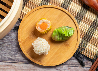 Authentic Asian Siu Mai dumplings, perfect for restaurant promotions. This image evokes culinary delight and cultural charm, ideal for food blogs and menus.