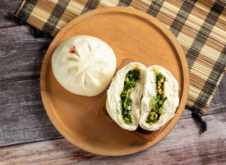 Delicious, savory steamed chive buns, filled with fresh, vibrant greens. Perfect for a quick,...