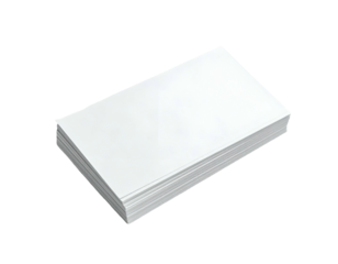 A neatly stacked, rectangular pile of bright white paper, angled slightly against a dark background