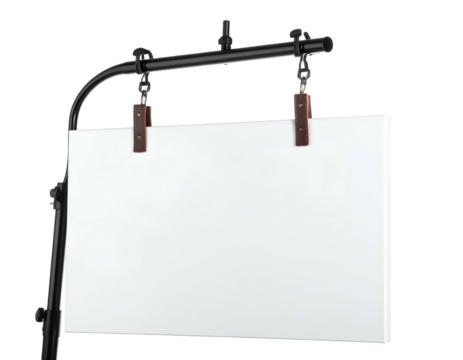 A plain, rectangular white sign hangs from a black metal frame with leather-like clips