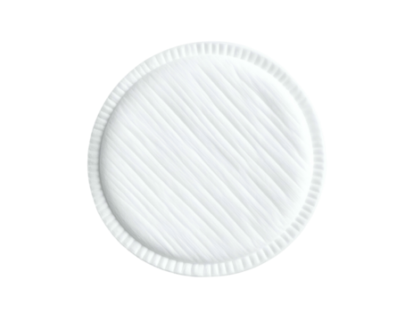 A clean, round, white pad with a textured surface and a ruffled edge sits isolated on black