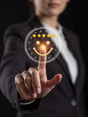 Businesswoman pressing smiley face touch screen and Business Service Satisfaction concept