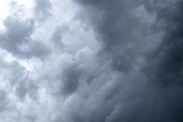 Dramatic sky background with stormy clouds lit from the left side