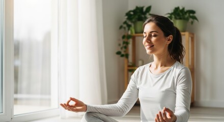 Serene Morning Meditation: Peaceful Woman Practicing Yoga in Sunlit Room
