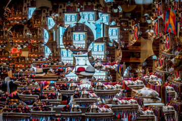 Antique shop through a glass plate with many lenses creating multiple images