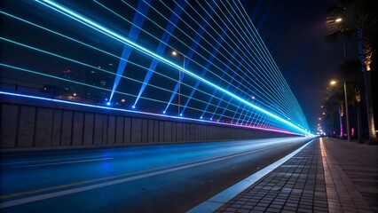 Futuristic city street at night with light trails and neon illumination effects
