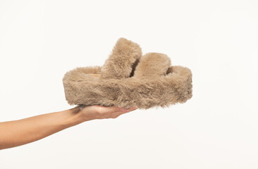 woman's palm fingers holding an object