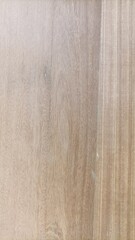 Natural light brown wood texture with fine grain pattern, perfect for background, design, and natural material concepts.