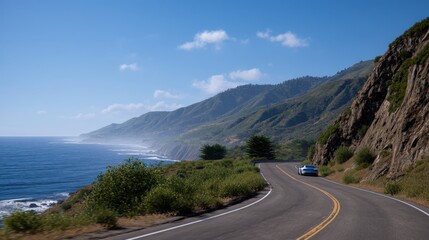 Fototapeta premium Winding Coastal Road Along Dramatic Cliffside with Scenic Ocean View and Blue Sky