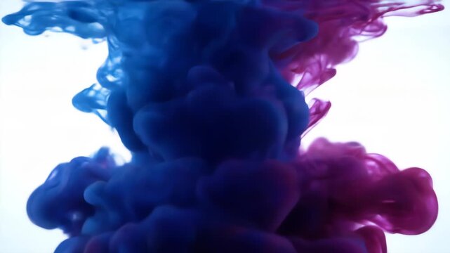 Vibrant blue and purple ink clouds swirl and dissolve downwards in clear water, creating an abstract, fluid art background with gentle, subtle movements.