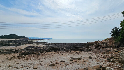 Rocky seashore at low tide under clear sky / 썰물 후 맑은 하늘 아래 펼쳐진 갯바위 해안