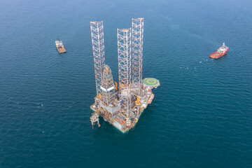 Aerial view of offshore jack up rig and offshore platform for oil and gas exploration and production