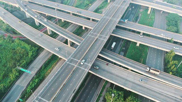 Aerial view city transport junction road morning light with vehicle movement transport industry