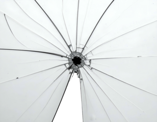 A shattered pane of glass radiating cracks outwards from a central point