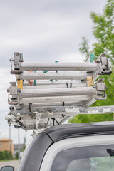 Ladder on top of business repair van