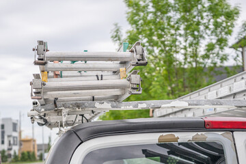 Ladder on top of business repair van