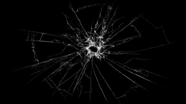 Breaking glass motion graphics. Cracked glass fracture effect Black background, Realistic Glass impact crack with detailed fractures on a black background. 
Glass Shattered and Breaks by Bullet Hit,