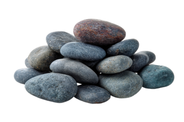A stack of five pebbles on a pebble beach with the ocean in the background.