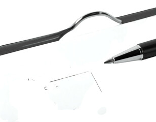 Close-up of a pen tip angled near a bent, curved metal tool, over white/black