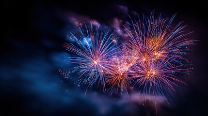 Brilliant Bursting Fireworks Display Illuminating the Night Sky with Vibrant Colors and Festive Celebrations