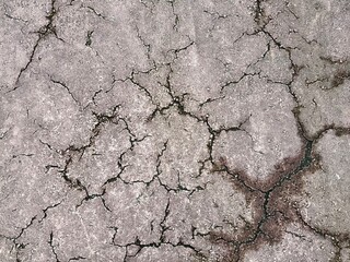 ひび割れたコンクリートの地面