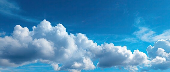 Wide shot of a partly cloudy bright blue sky (1)