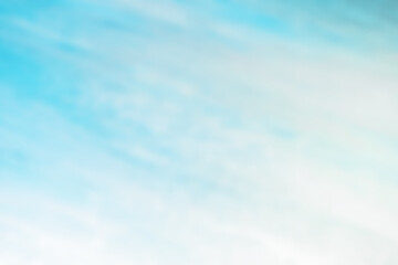abstract blur vintage blue cyan color background on wall to loft soft paint for interior exterior art and defocus cloud sky texture pattern to wallpaper pastel light gradient backdrop with copy space