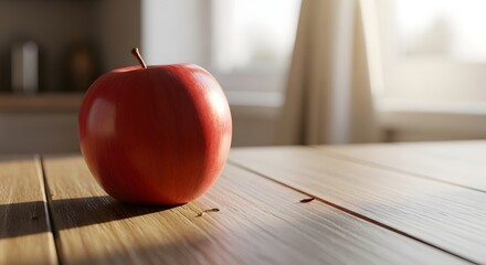 Vibrant red apple on a wooden table with natural sunlight background